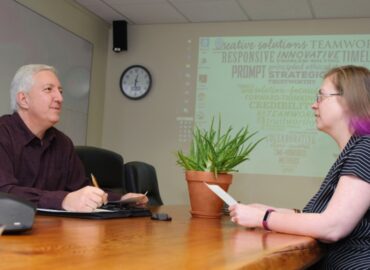 Mediation and litigation support - two people at a conference table