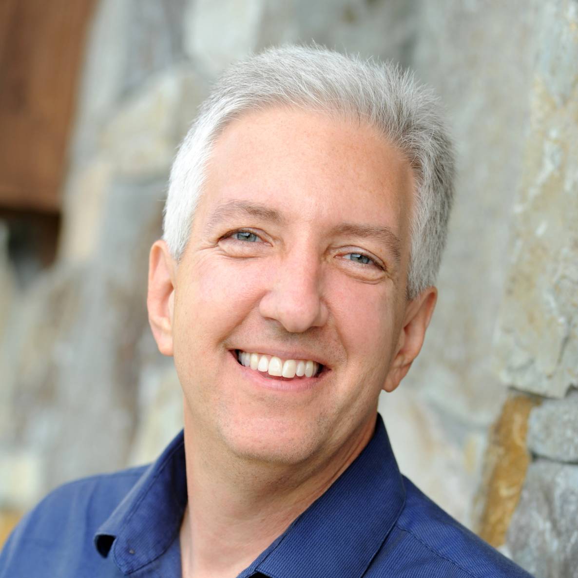 smiling-farallon-employee-with-short-gray-hair-and-blue-shirt