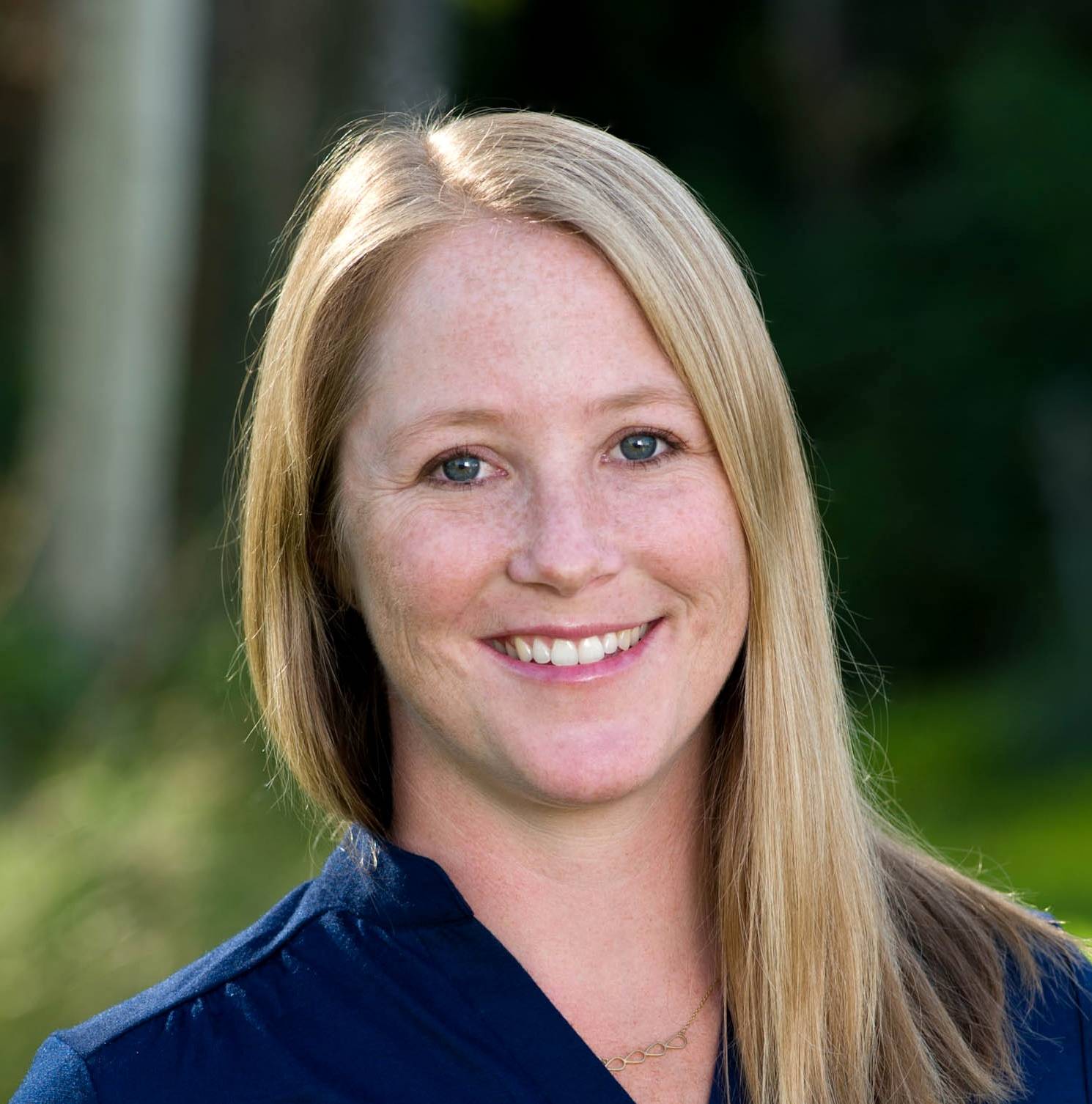 smiling-farallon-employee-with-long-blonde-straight-hair