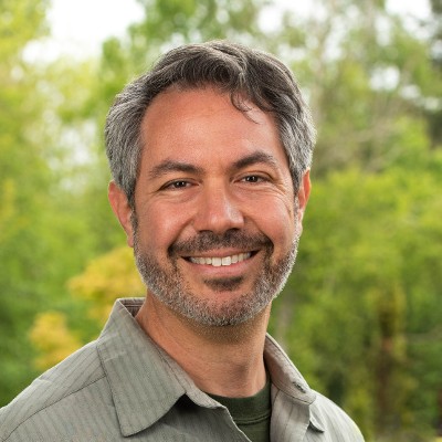 smiling-farallon-employee-with-salt-and-pepper-hair-and-goatee