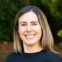 Farallon-employee-in-black-top-smiling-at-camera