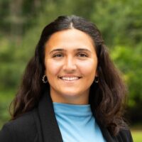 smiling-farallon-employee-with-long-black-hair