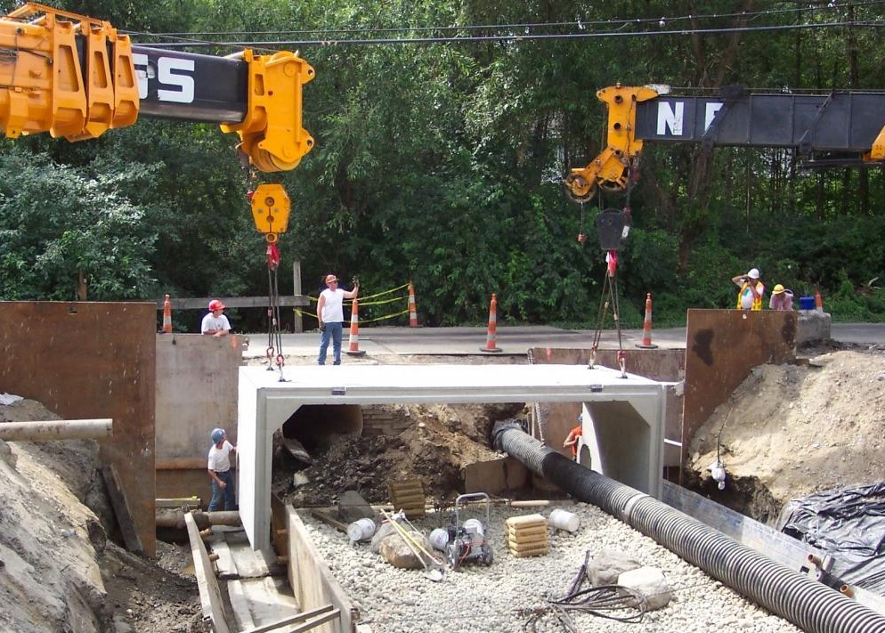 Construction equipment under a bridge