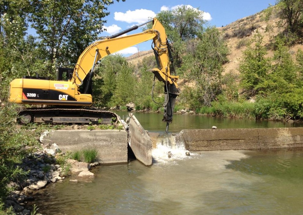 Construction Equipment cleaning up water