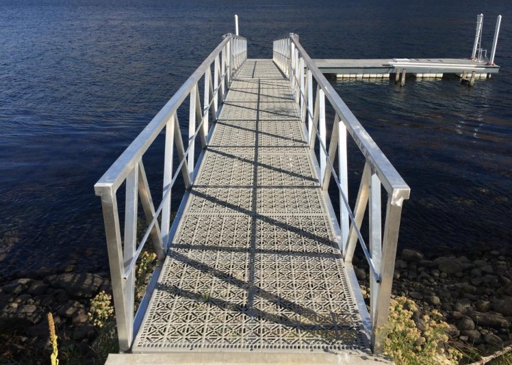 metal bridge leading to a dock