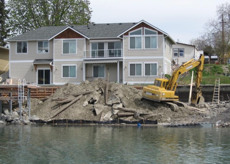 debris in front of a house