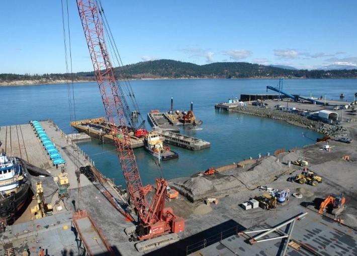 construction equipment next to a dock