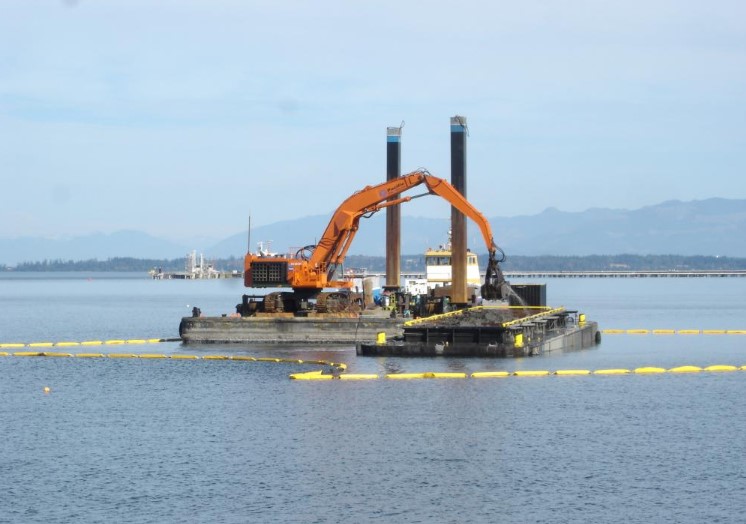 construction equipment on top of water
