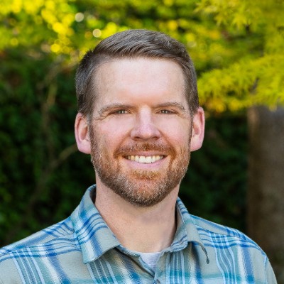 Smiling-Farallon-Employee-Ben-Paulson-in-blue-collared-shirt